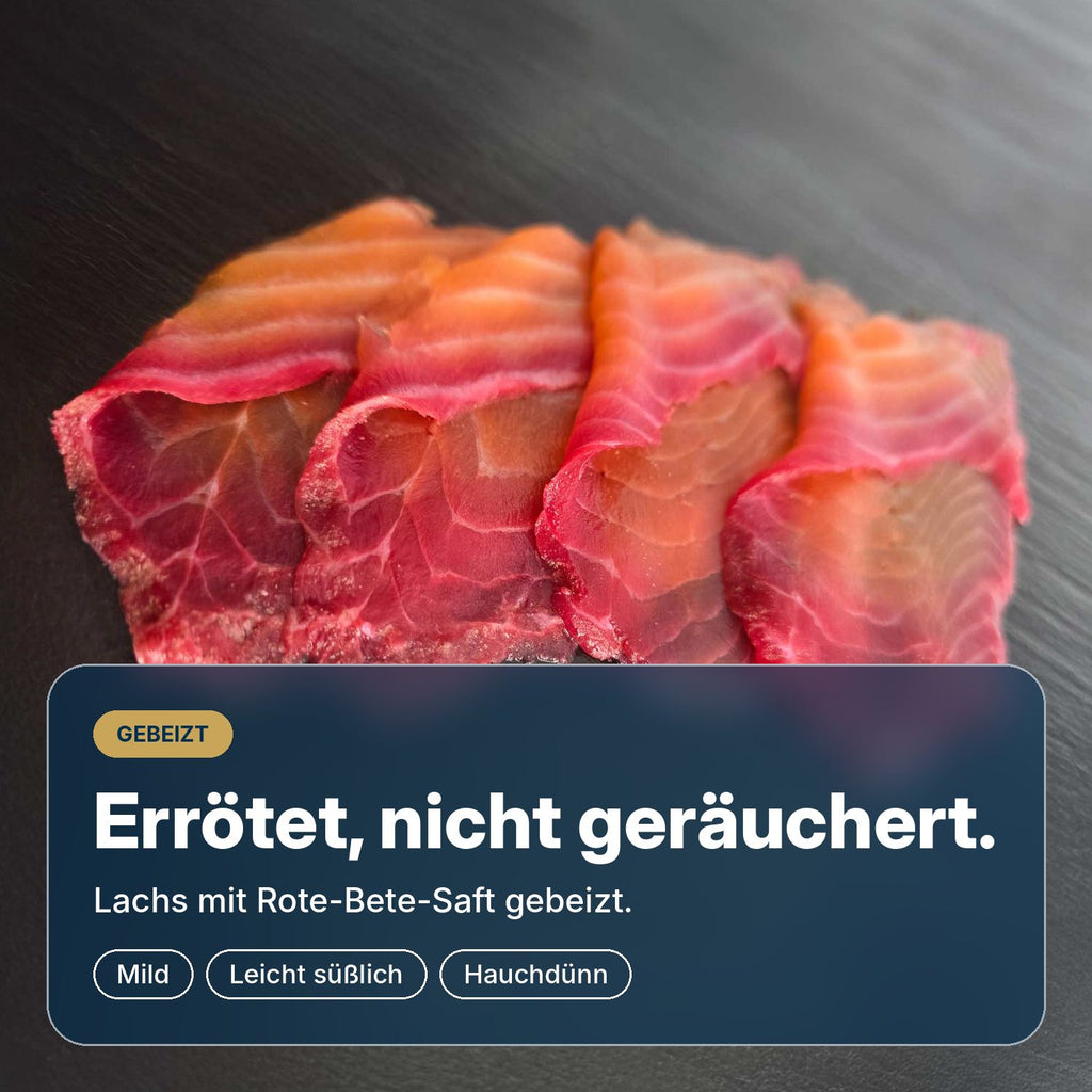 Errötet, nicht geräuchert: Rote-Bete-Lachs, mit Rote-Bete-Saft gebeizt, mild, fein süßlich und hauchdünn geschnitten.